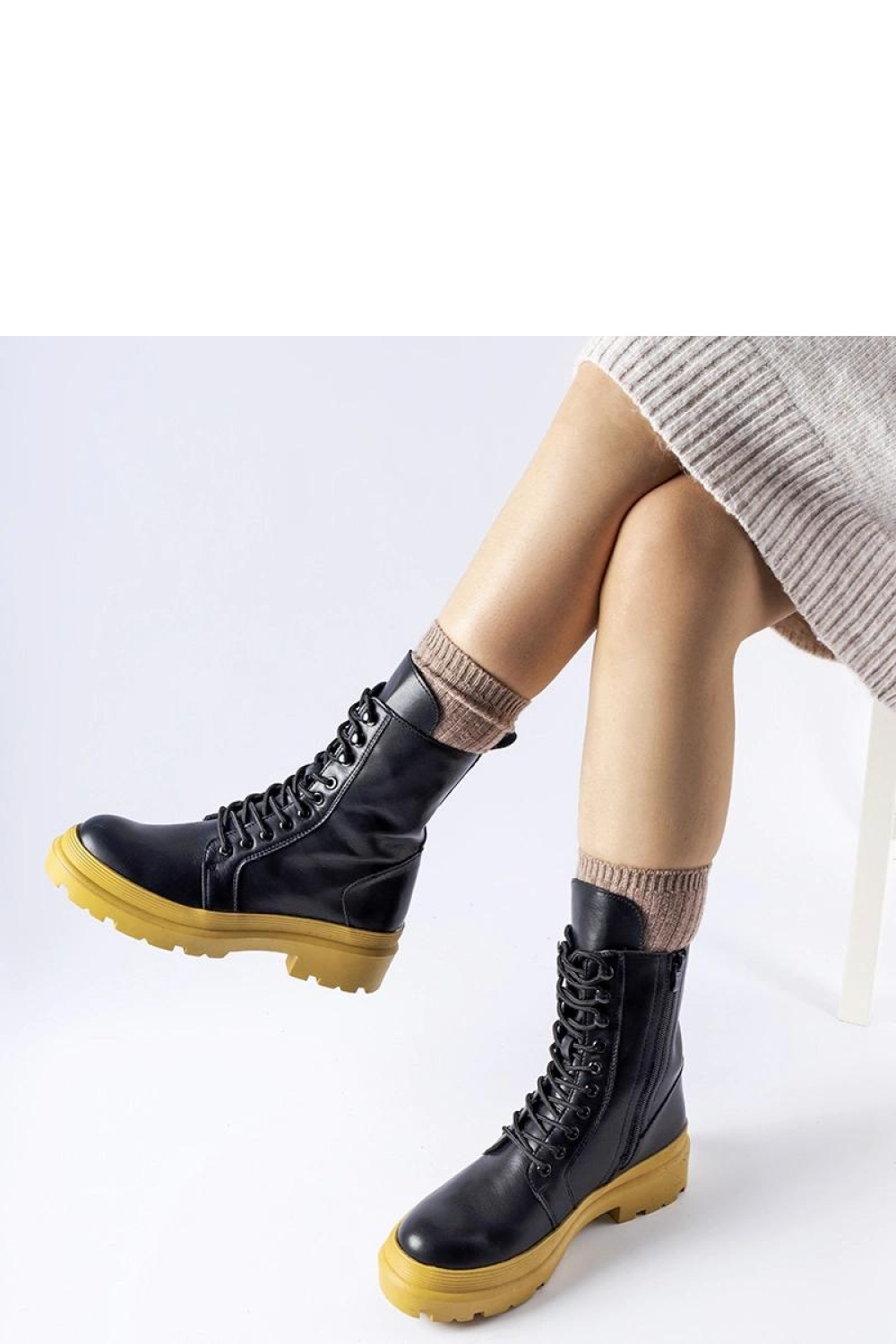 Quennie black ankle boots on a yellow sole - Solea